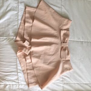 Shorts with a skirt overlay